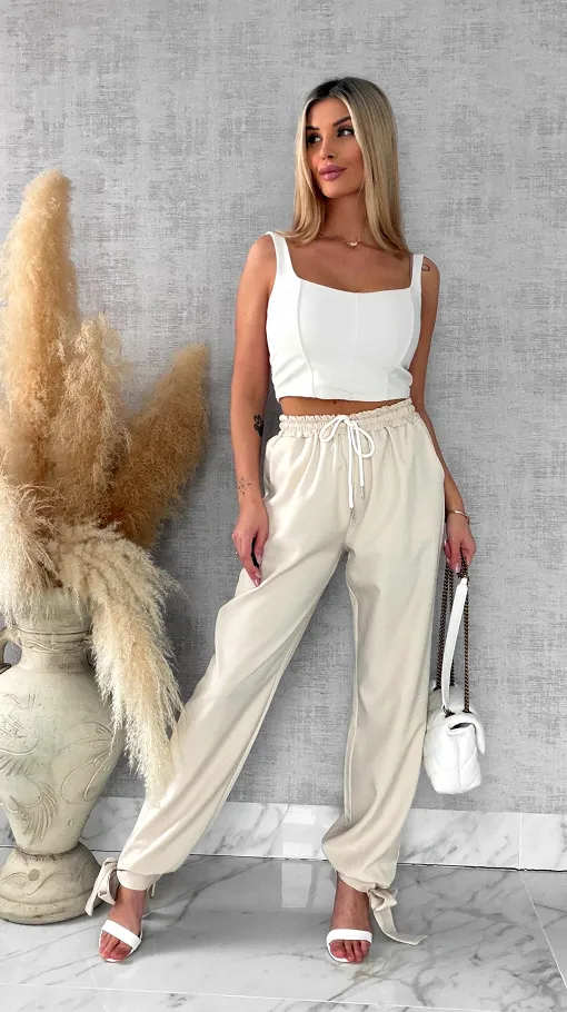 Wiosenne beżowe spodnie z gumką w pasie i wiązanymi nogawkami ONE SIZE - R672A