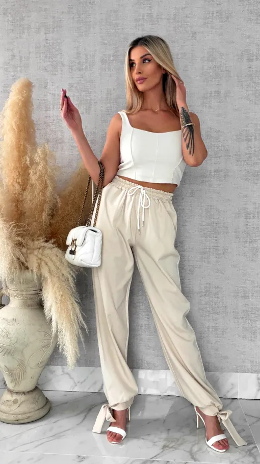Wiosenne beżowe spodnie z gumką w pasie i wiązanymi nogawkami ONE SIZE - R672A