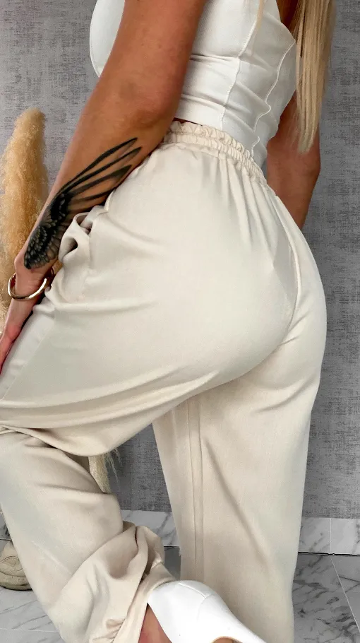 Wiosenne beżowe spodnie z gumką w pasie i wiązanymi nogawkami ONE SIZE - R672A