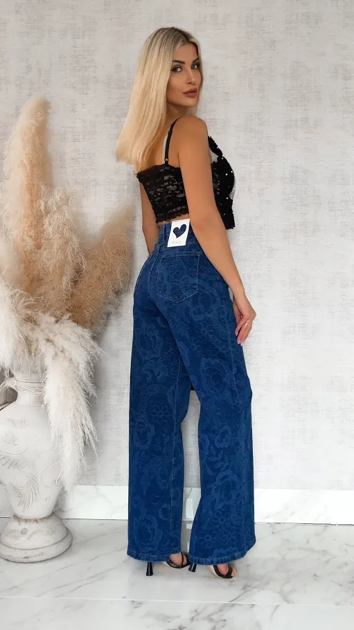 Elastyczne spodnie jeansowe w dekatyzowane kwiaty BLUE JEANS - R777
