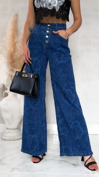 Elastyczne spodnie jeansowe w dekatyzowane kwiaty BLUE JEANS - R777