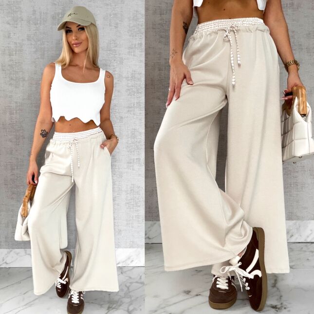 Luźne spodnie dresowe z ozdobnym pasem BEŻOWE - R564B