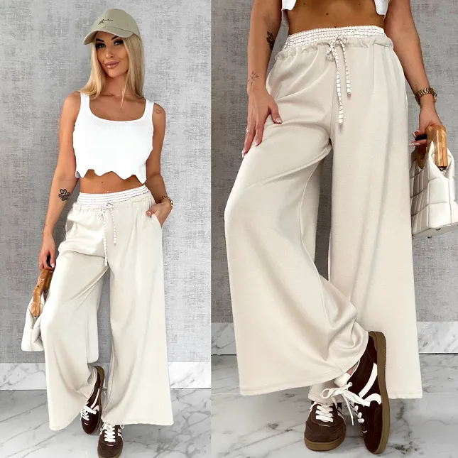 Luźne spodnie dresowe z ozdobnym pasem BEŻOWE - R564B