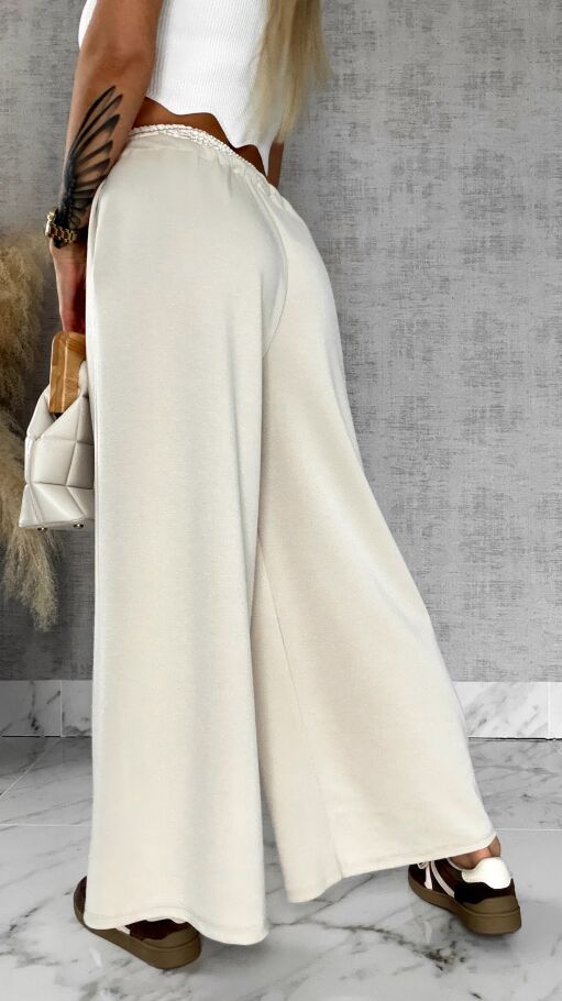 Luźne spodnie dresowe z ozdobnym pasem BEŻOWE - R564B