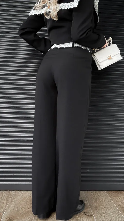 Czarne eleganckie spodnie z białą koronką w pasie - R391