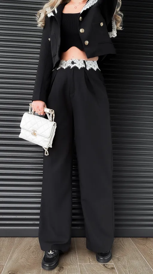 Czarne eleganckie spodnie z białą koronką w pasie - R391