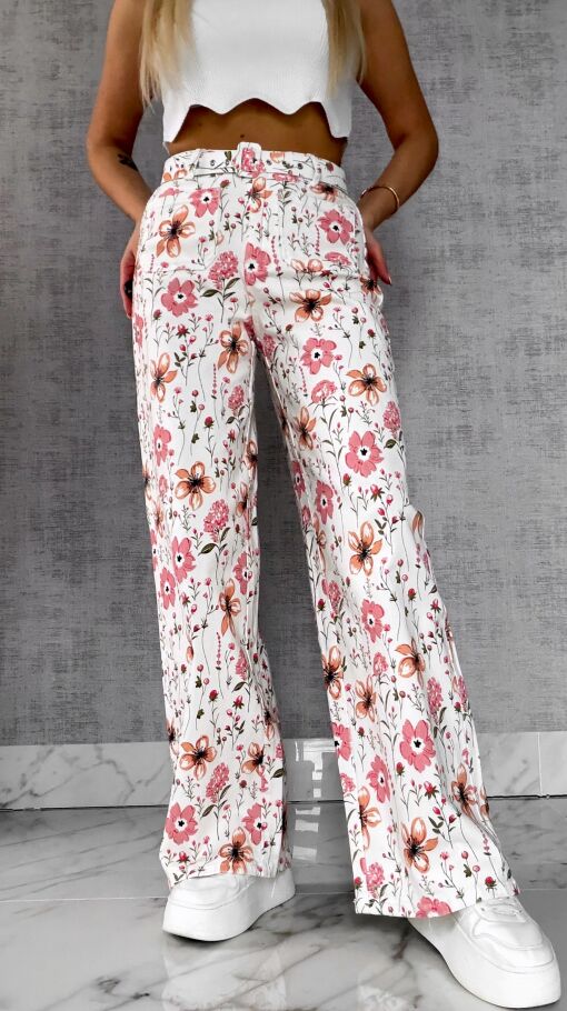 Elastyczne spodnie jeansowe WHITE JEANS w kolorowe kwiaty - R602A