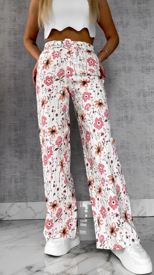 Elastyczne spodnie jeansowe WHITE JEANS w kolorowe kwiaty - R602A