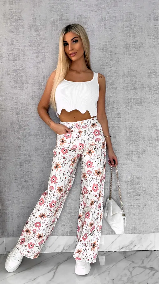 Elastyczne spodnie jeansowe WHITE JEANS w kolorowe kwiaty - R602A