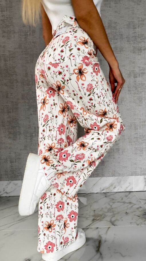 Elastyczne spodnie jeansowe WHITE JEANS w kolorowe kwiaty - R602A