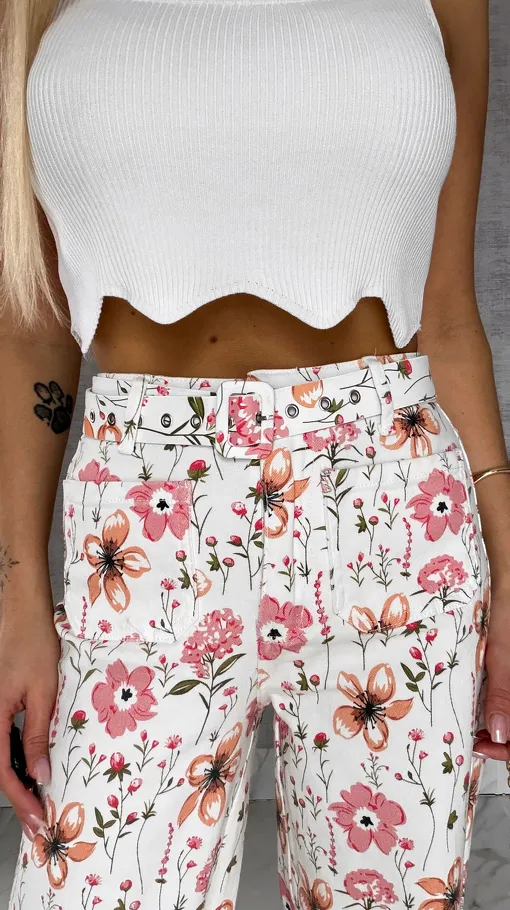 Elastyczne spodnie jeansowe WHITE JEANS w kolorowe kwiaty - R602A