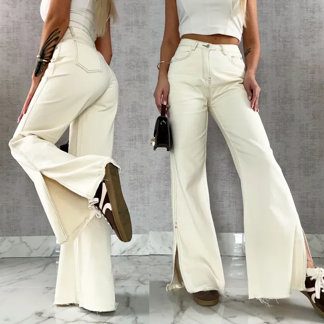 Super spodnie jeansowe z rozcięciami na nogawkach ECRU - R500