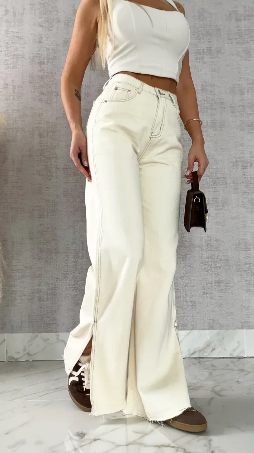 Super spodnie jeansowe z rozcięciami na nogawkach ECRU - R500