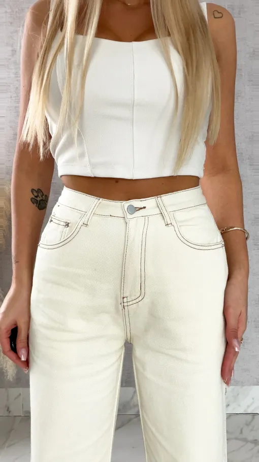 Super spodnie jeansowe z rozcięciami na nogawkach ECRU - R500