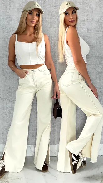 Super spodnie jeansowe z rozcięciami na nogawkach ECRU - R500