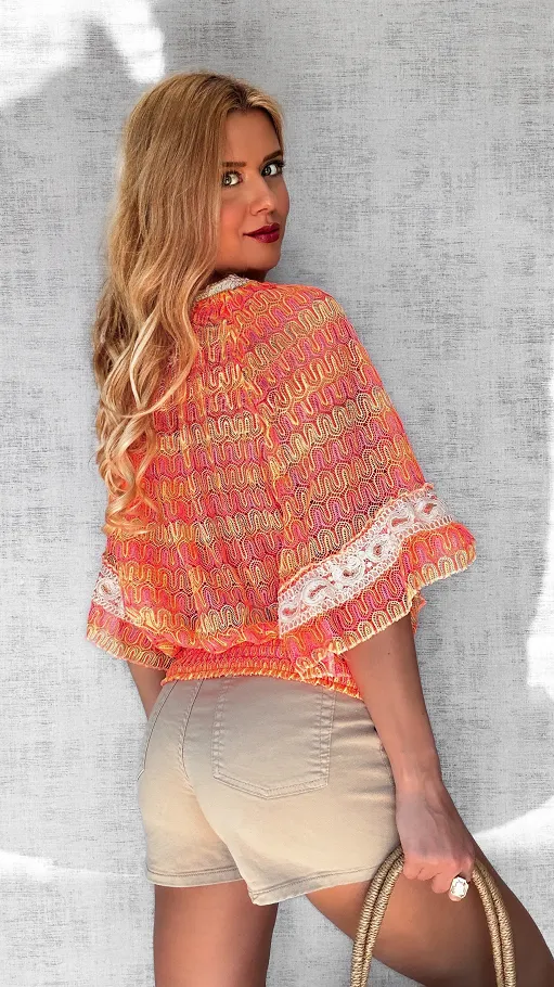 Ażurowa luźna bluzka z gumką w pasie i trokami na dekolcie NEON orange - P687A