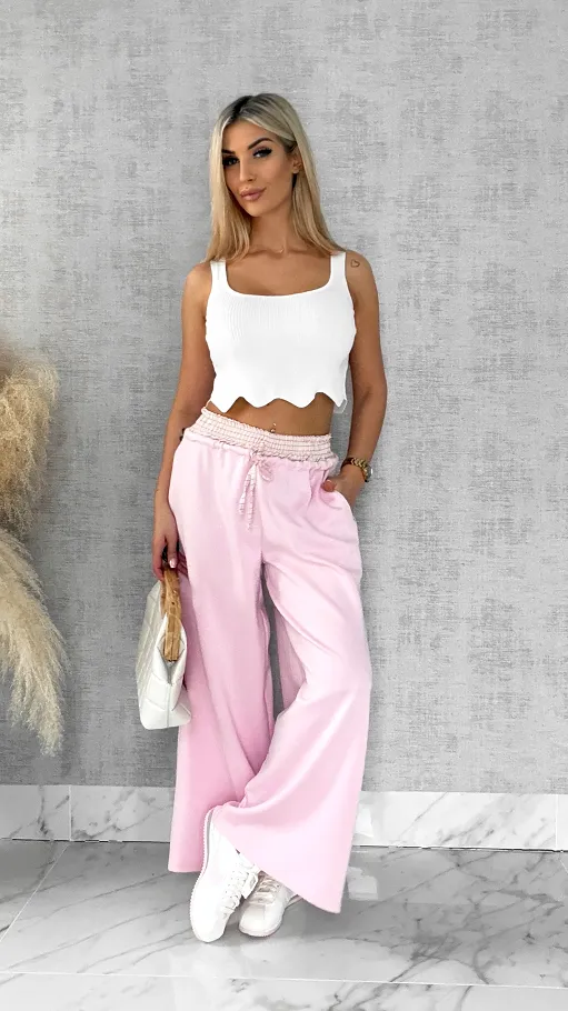 Luźne spodnie dresowe z ozdobnym pasem PINK - R564