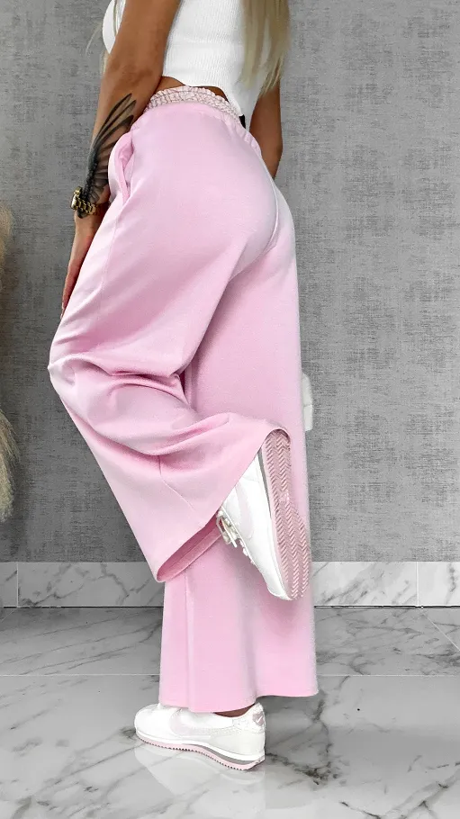 Luźne spodnie dresowe z ozdobnym pasem PINK - R564