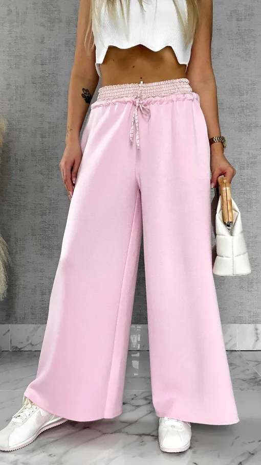 Luźne spodnie dresowe z ozdobnym pasem PINK - R564