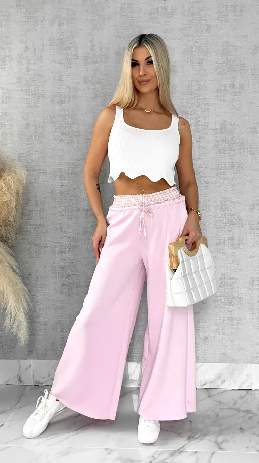 Luźne spodnie dresowe z ozdobnym pasem PINK - R564