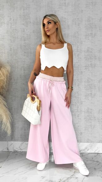 Luźne spodnie dresowe z ozdobnym pasem PINK - R564