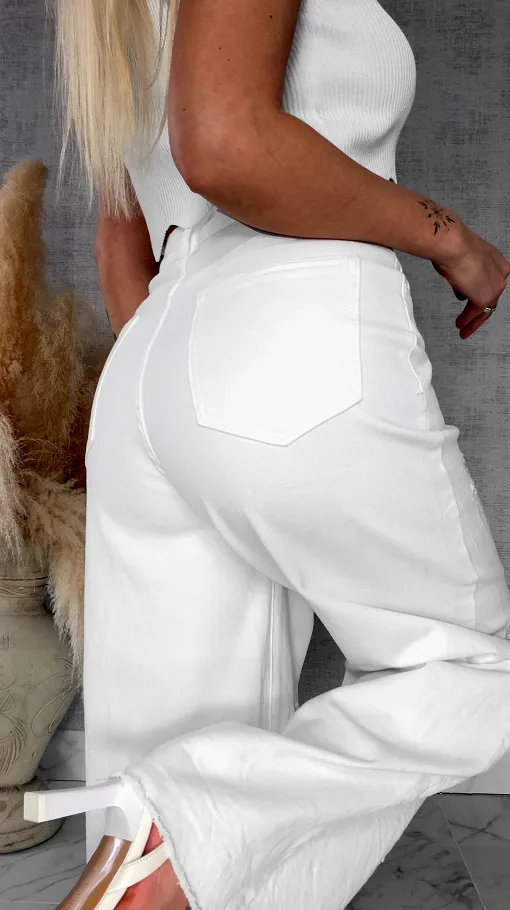 Elastyczne BIAŁE spodnie jeansowe z haftowanymi kwiatami - R707