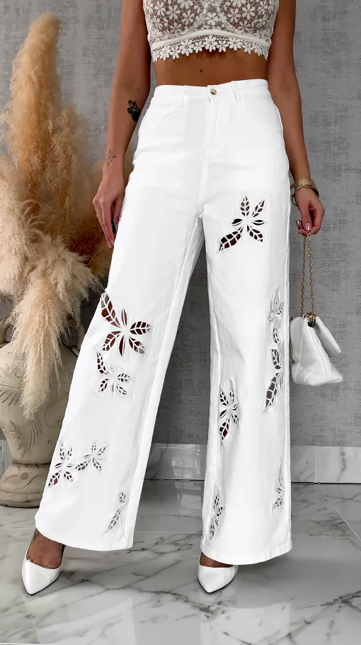 Oryginalne elastyczne spodnie jeansy z haftowanymi kwiatami BIAŁE - R709